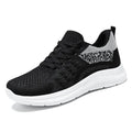 Women's black mesh casual sneakers with lace-up front and round toe