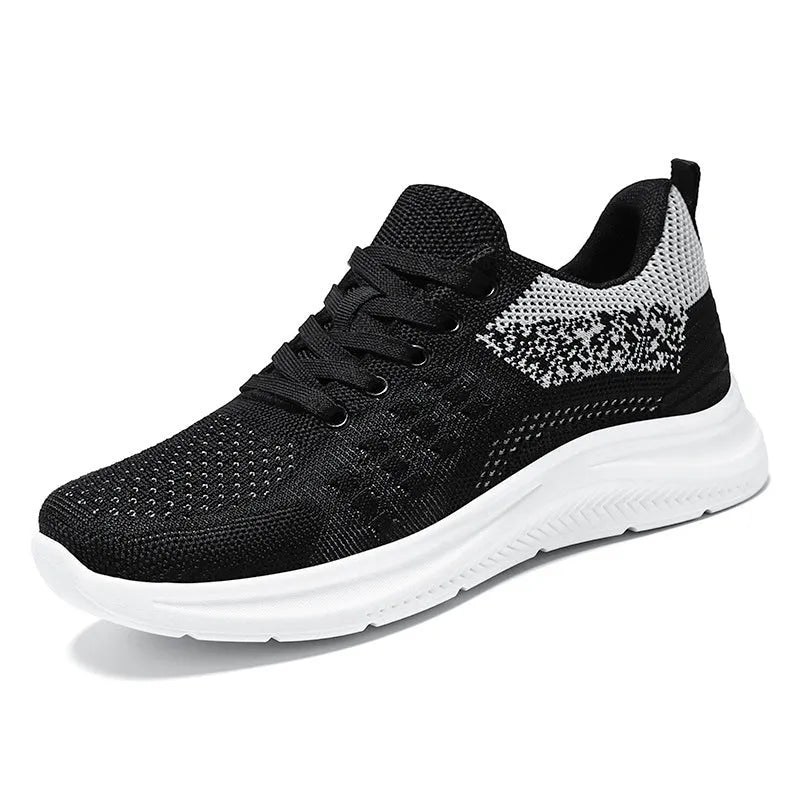 Women's black mesh casual sneakers with lace-up front and round toe