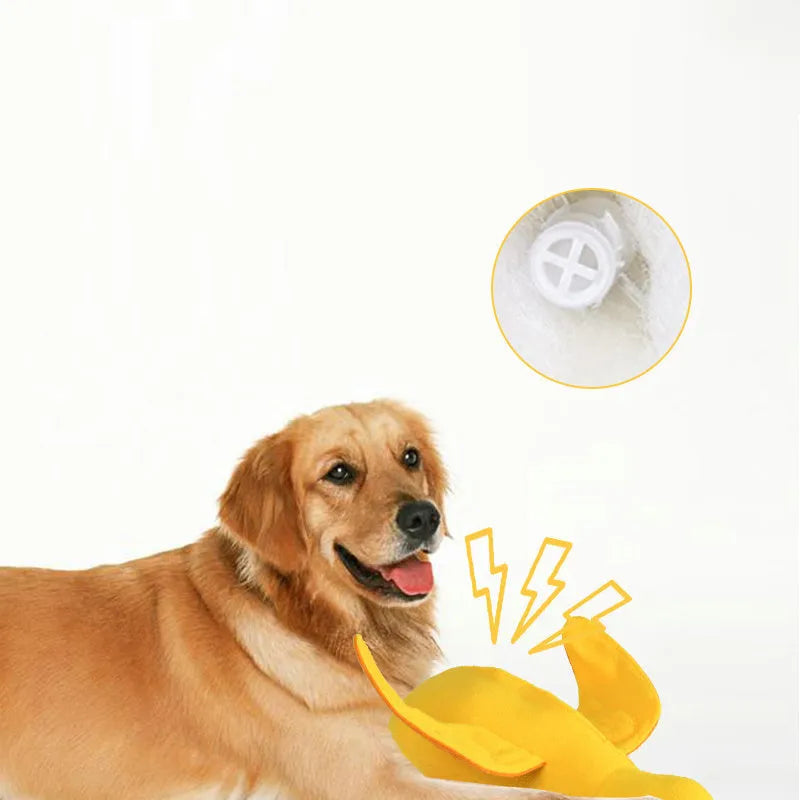 Yellow teddy bear duck plush dog toy with squeaker and treat holes.