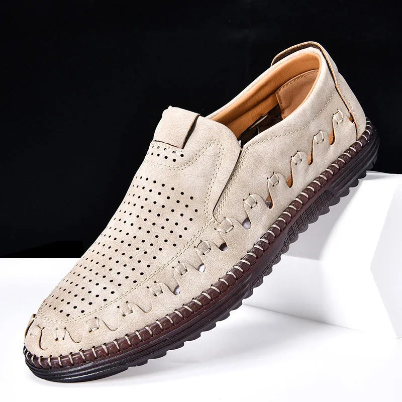 Men's brown slip-on casual leather shoes with round toe and flat heel on a white background.