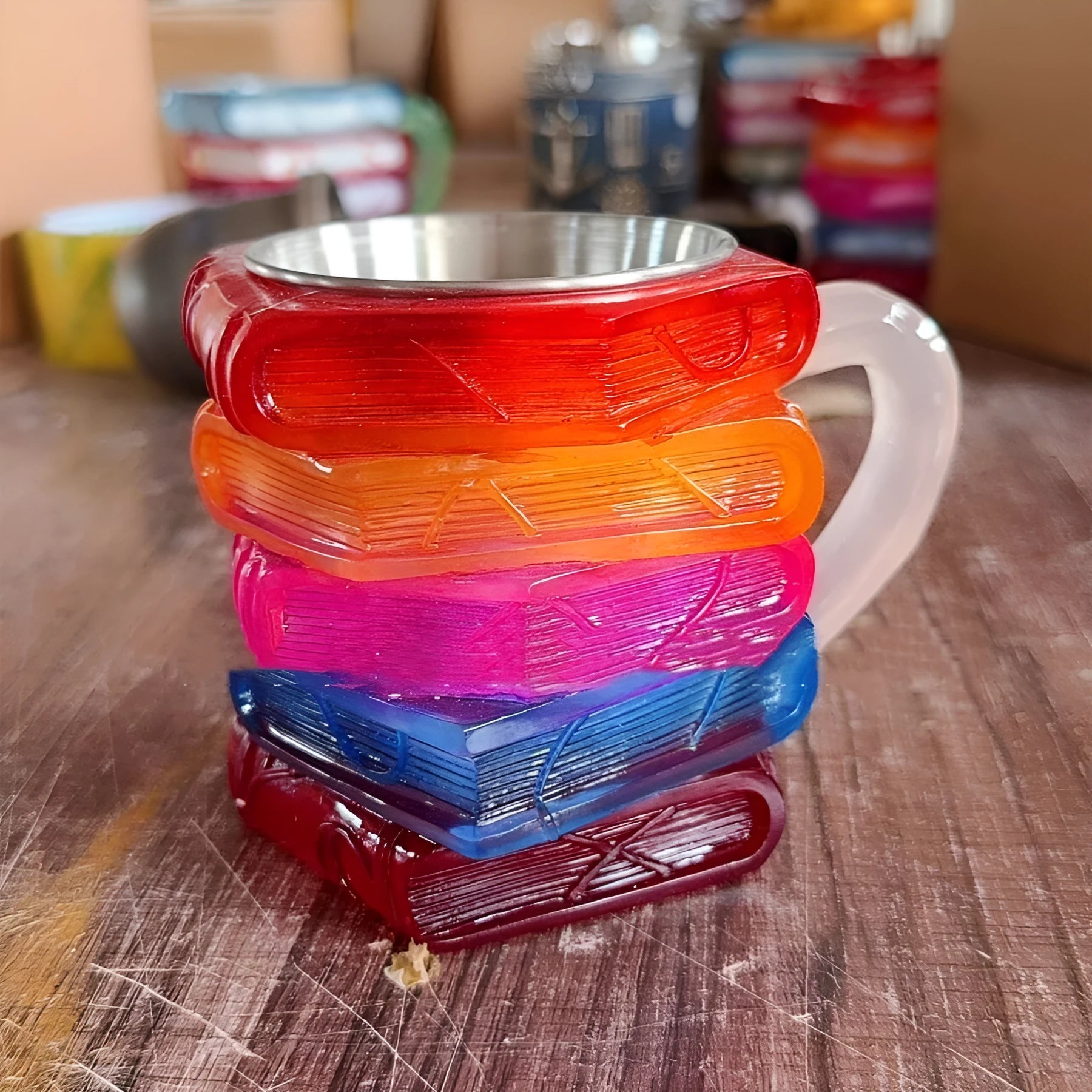 Painted synthetic resin coffee cup ornament for shelf display in Library or Pattern style.