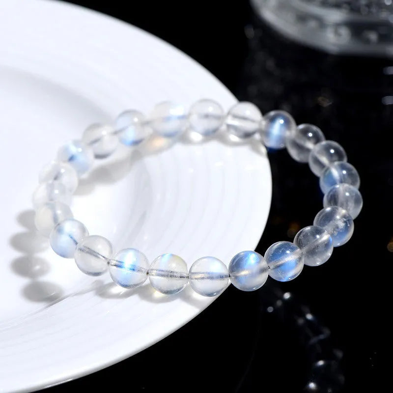 Natural cream body blue moonlight crystal bracelet with minimalist design showing ground finish stone