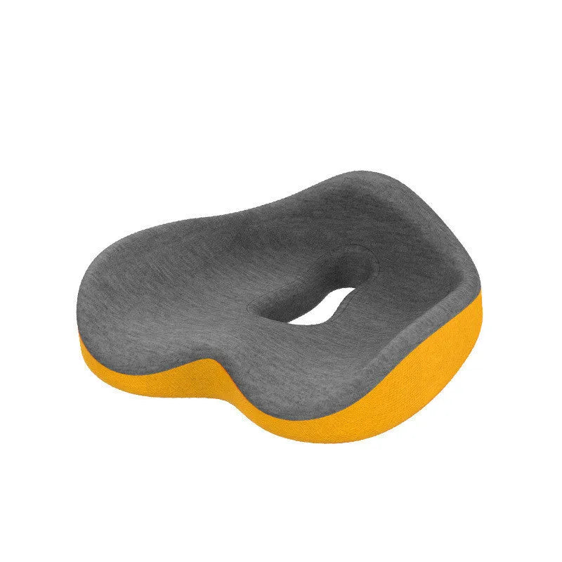 Memory foam seat cushion in light grey and navy blue on an office chair, 43x36x14cm