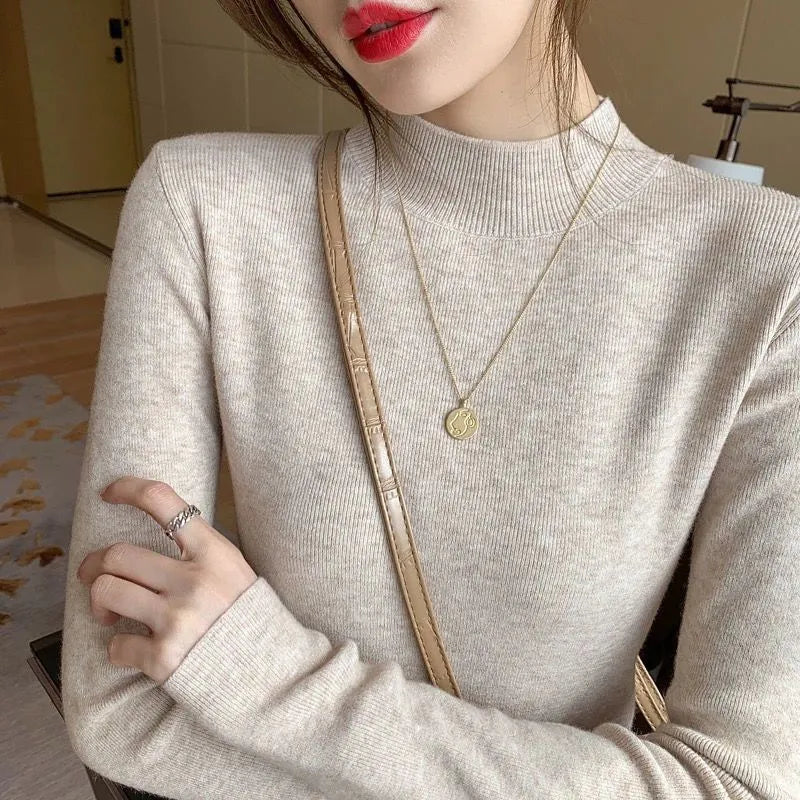 Viscose pullover top slim fit long sleeve in apricot colour showing front view
