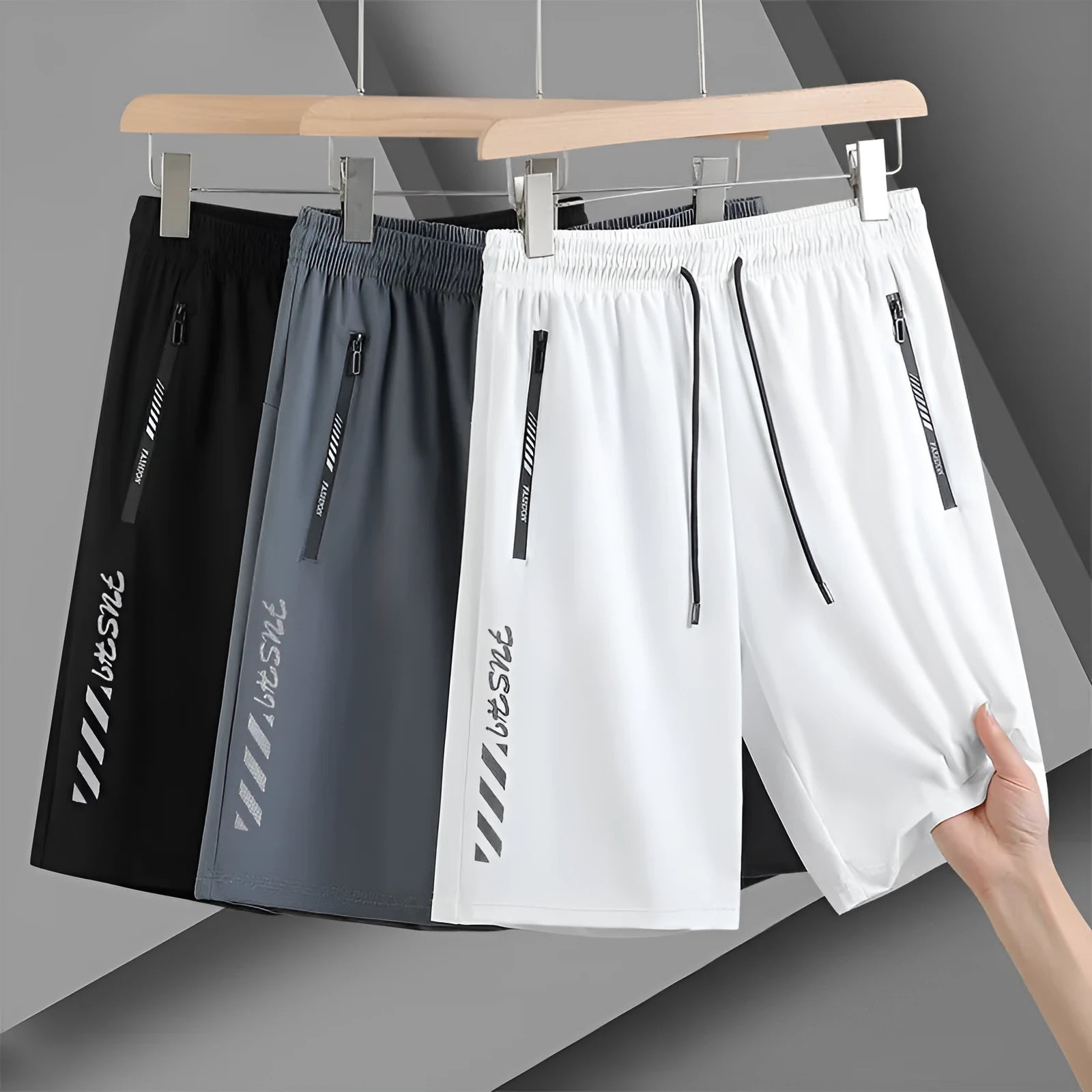 Men's black quick-drying nylon sports shorts with loose fit and fifth pants length
