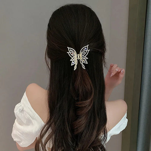Butterfly-shaped hair clip for women in alloy metal with rhinestone or pearl decorative elements