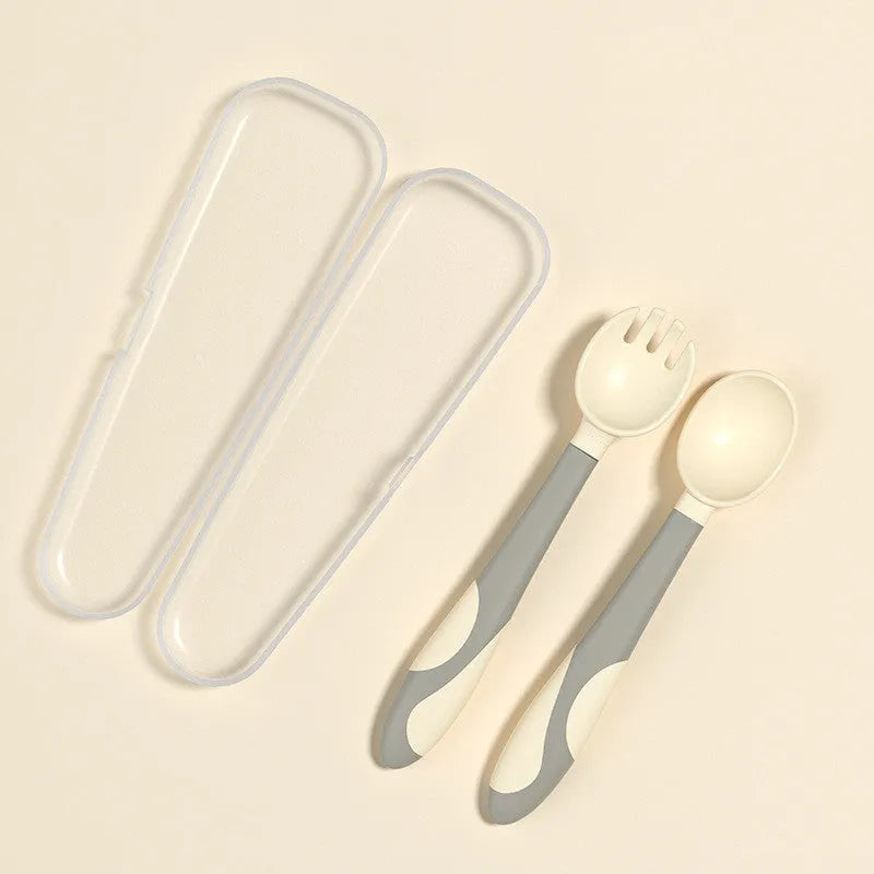 Baby training fork and spoon set with twist design in Blue, made from BPA-free food grade PP and TPE, featuring spoon baffle
