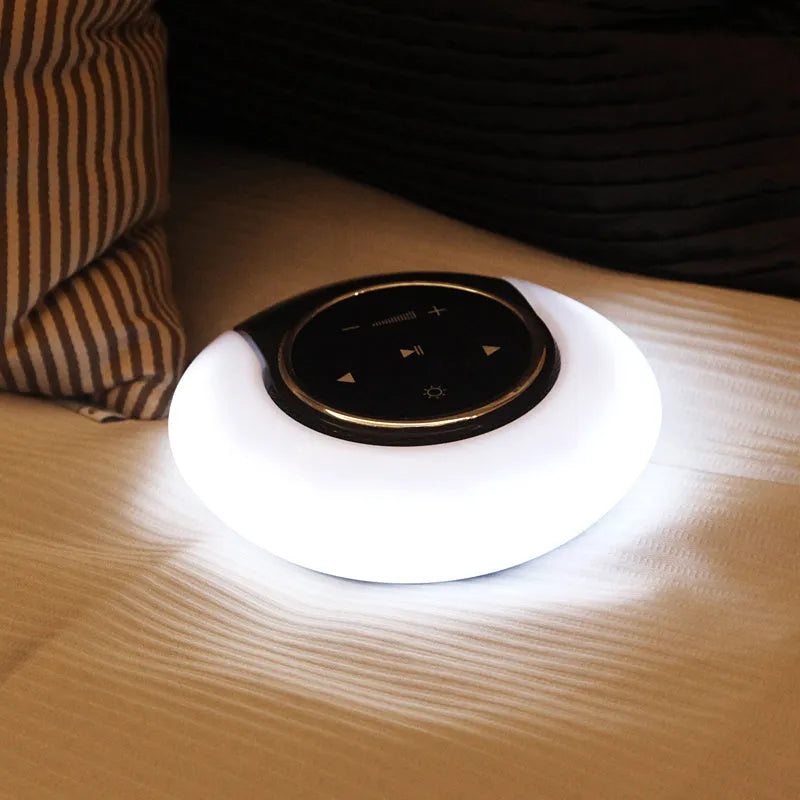 Blue cubic Bluetooth desk lamp with speaker and touch controls for dimming and colour selection