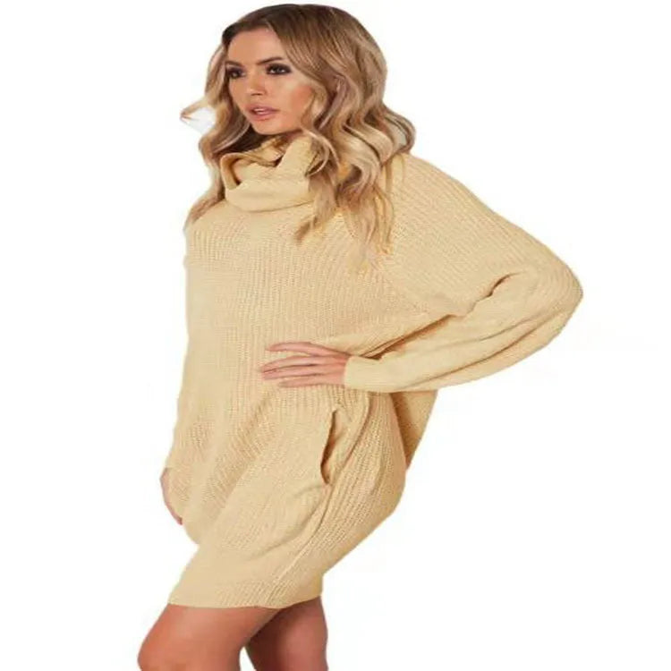 Loose fit mid-length pullover sweater with pockets in imitation cashmere fabric.