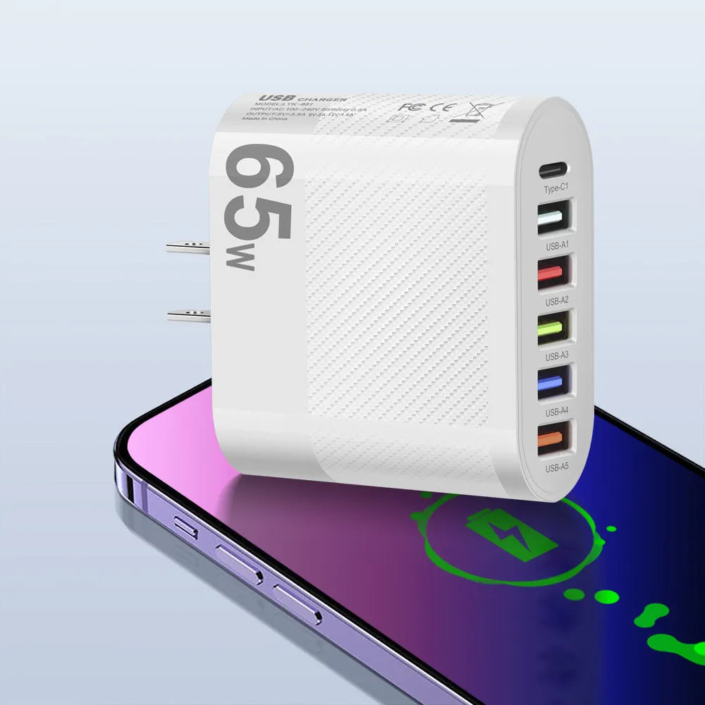 White plastic USB charging plug with interchangeable UK, US, and EU power outlets for Type-C phones.