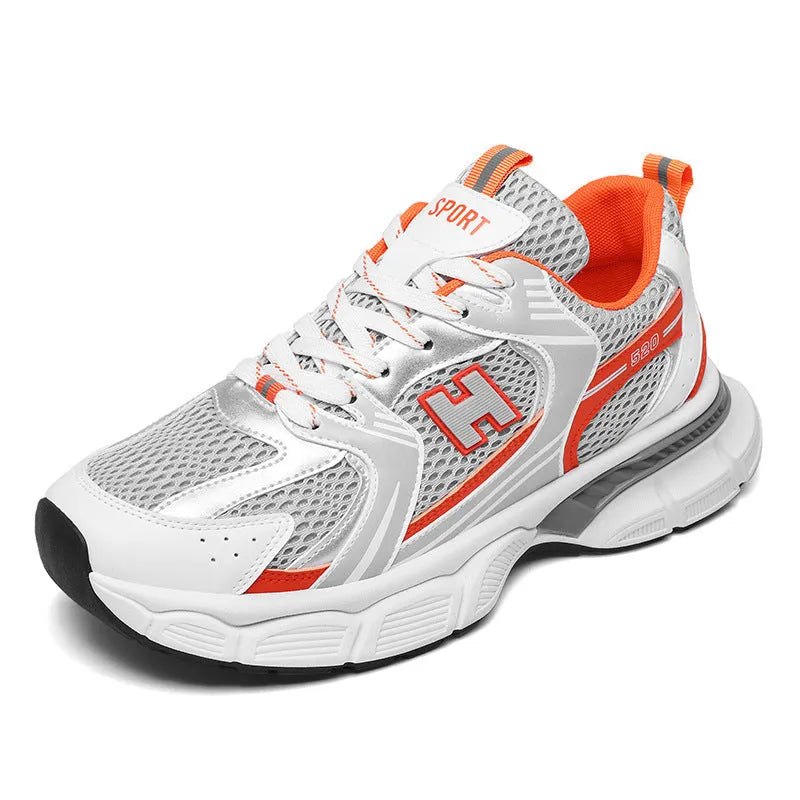 Men's white and grey mesh running shoes with a round toe and plastic sole on a plain background.
