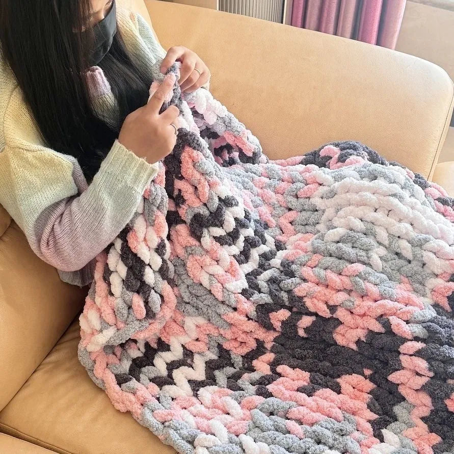 Coarse yarn chenille knitted blanket with braided gravity weighting in modern simplicity styling