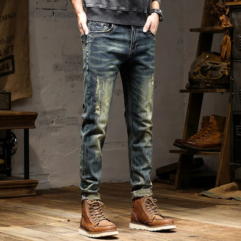 Men's skinny-fit jeans in a retro blue colour with a zip fly, shown laid flat.