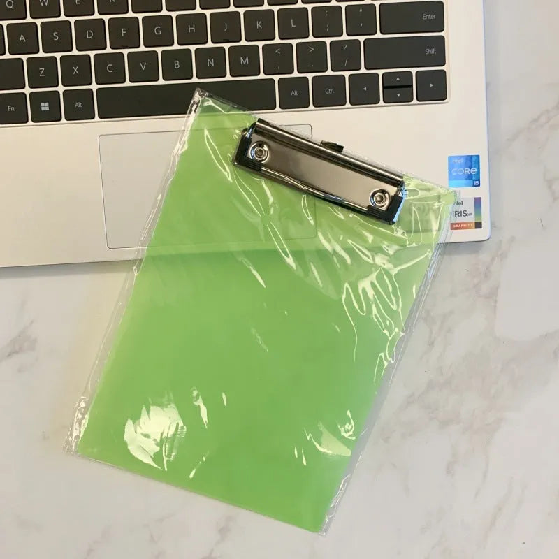 Transparent A4 clipboard with metal clip holding white paper, available in blue, green, red, and white.