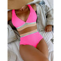 Women's high waist bikini set in solid pink colour, made from nylon fabric.