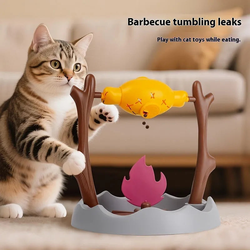 Large barbecue-themed tumbling cat feeder toy for slow feeding and play.