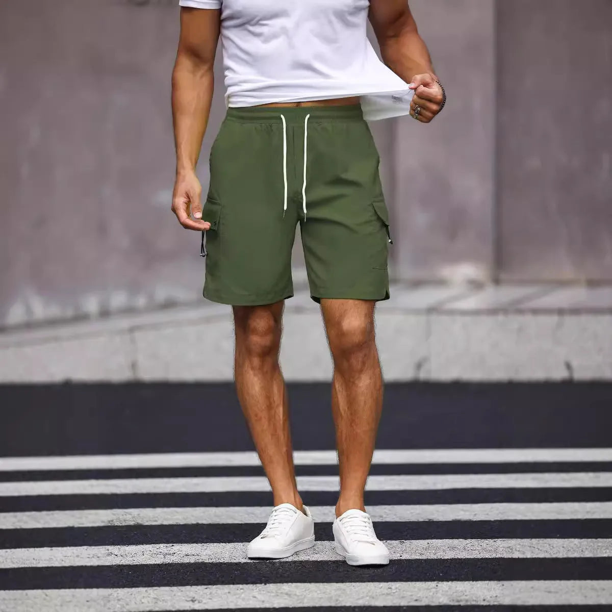 Men's loose fit work shorts in fluorescent green and army green colours with straight cut design