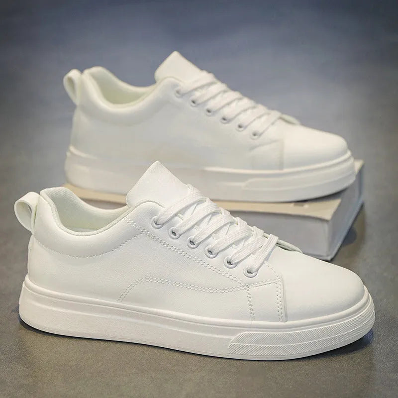 Men's low-top Korean-style sneakers in black, white, and black with white sole colour options.