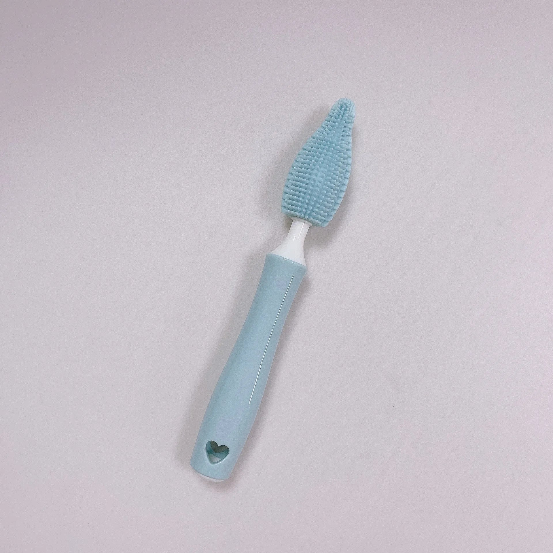 Silicone baby bottle brush set with main brush and separate straw cleaner in pink, blue and yellow colours.