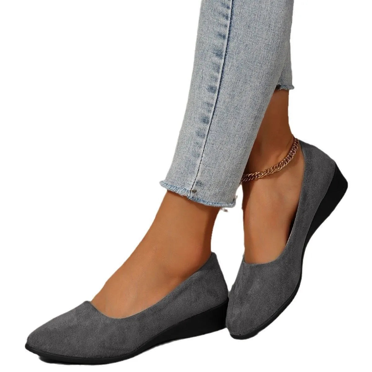 Women's suede wedge pump shoes in light brown with a low rubber sole and rounded toe.