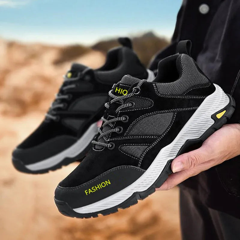 Men's black lace-up sneakers with flyknit upper, round toe, and flat sole