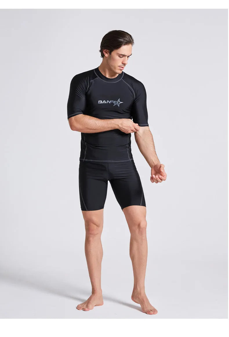 Men's navy blue quick-dry nylon swimsuit set with half sleeves and long swim pants