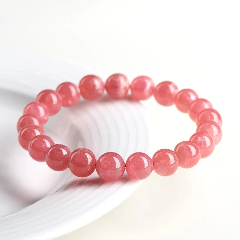 Women's geometric crystal bracelet with longevity lock fastening in rhodochrosite colour with multiple bead size options