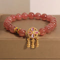 Women's strawberry quartz bracelet with four-leaf clover dream catcher pendant