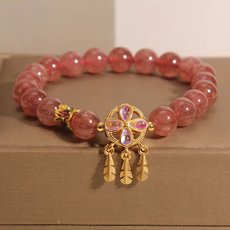 Women's strawberry quartz bracelet with four-leaf clover dream catcher pendant