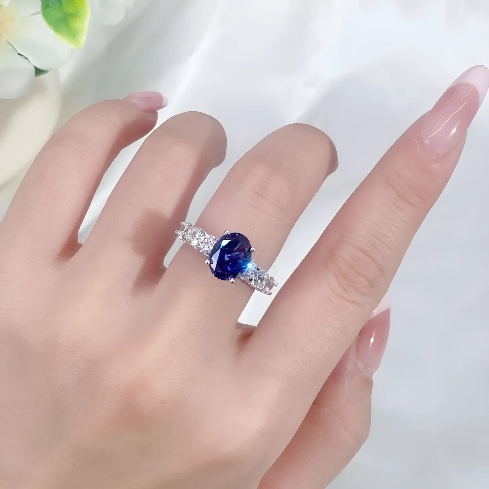 925 sterling silver ring with a heart-shaped Tanzanite colour zircon stone in an ice flower cut.
