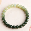Natural Hetian jade bracelet with sunny water gradient colour on wrist