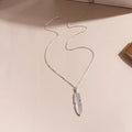 Retro feather tassel necklace for women in gold with geometric leaf pendant and feather tassel on alloy chain