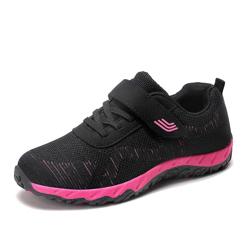 Women's gray purple low-top casual shoes with velcro strap and wedge heel.