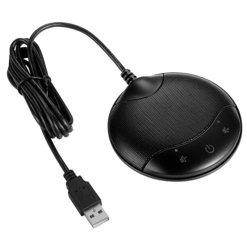 Black cube-shaped A7 USB condenser microphone on a desktop next to a computer.