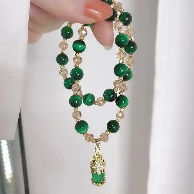 Handmade Tigereye crystal bracelet on a single chain and double chain in green and rose red styles.