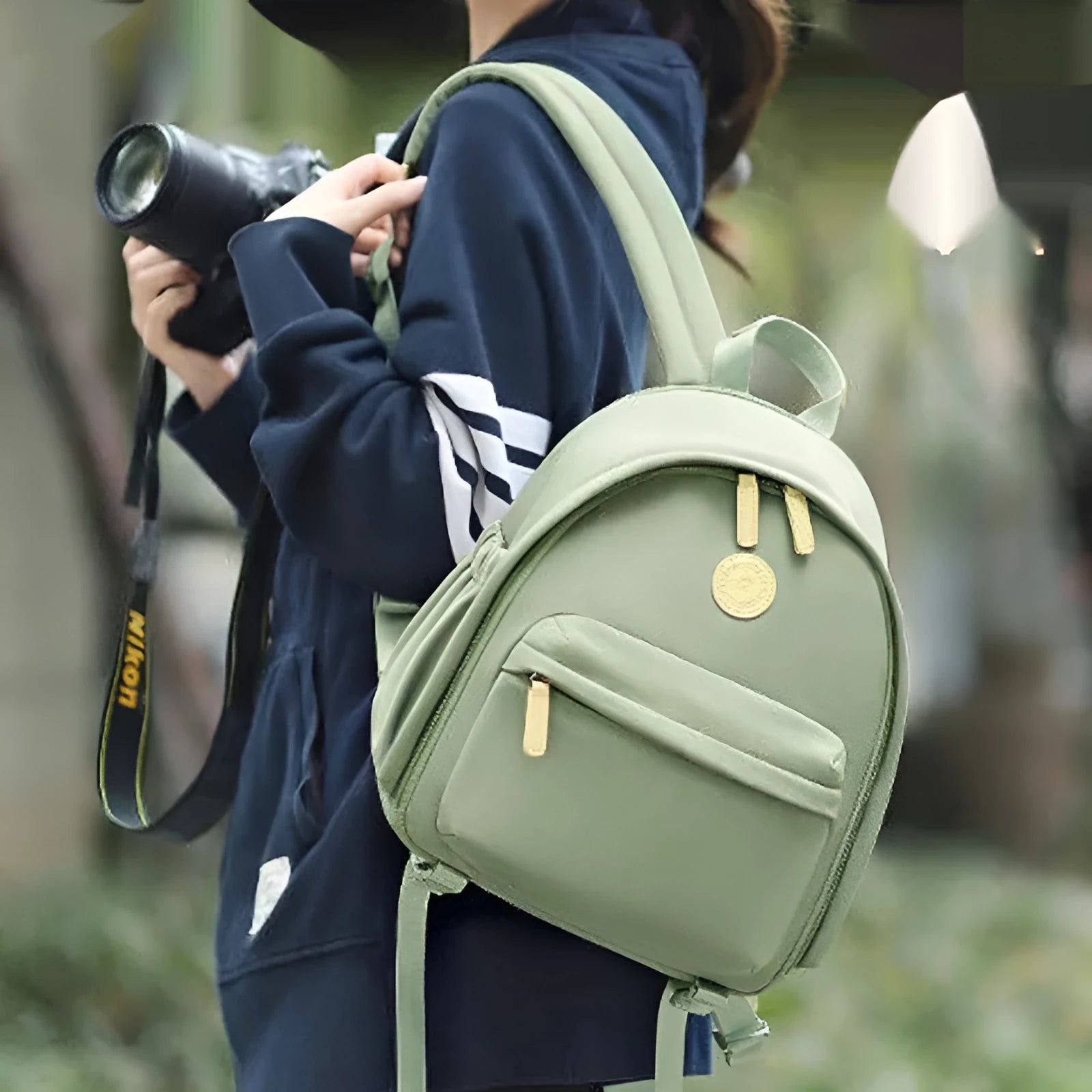 Solid colour shoulder camera bag for women with a detachable iPad compartment and a curve shoulder strap.