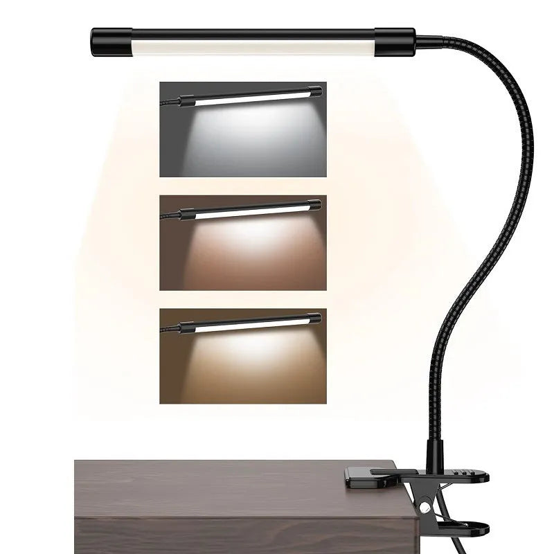 Black and white 26cm USB-powered LED desk lamp on a desk for study lighting.