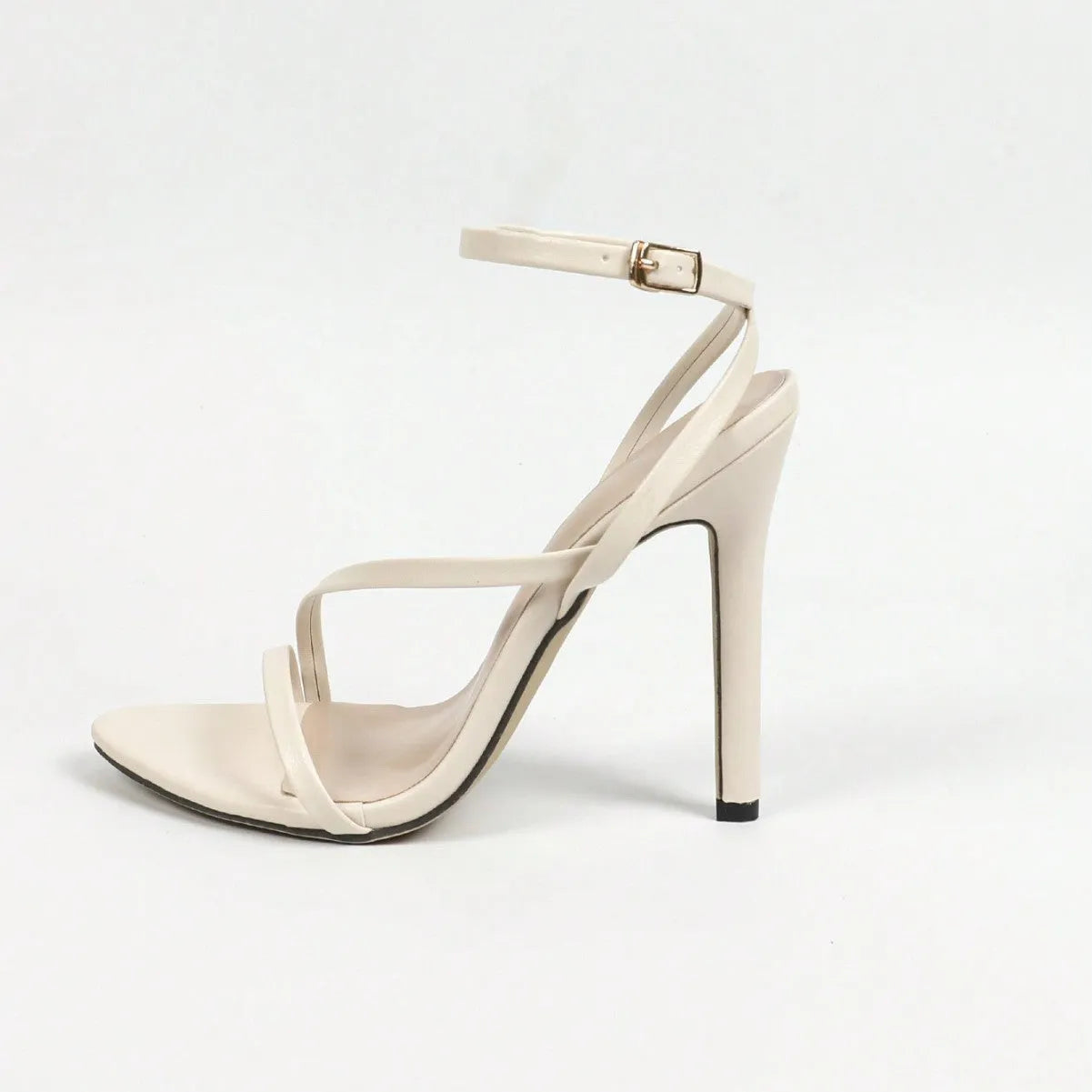 Women's open toe heels with cross ankle straps in gold, silver and milky white colours
