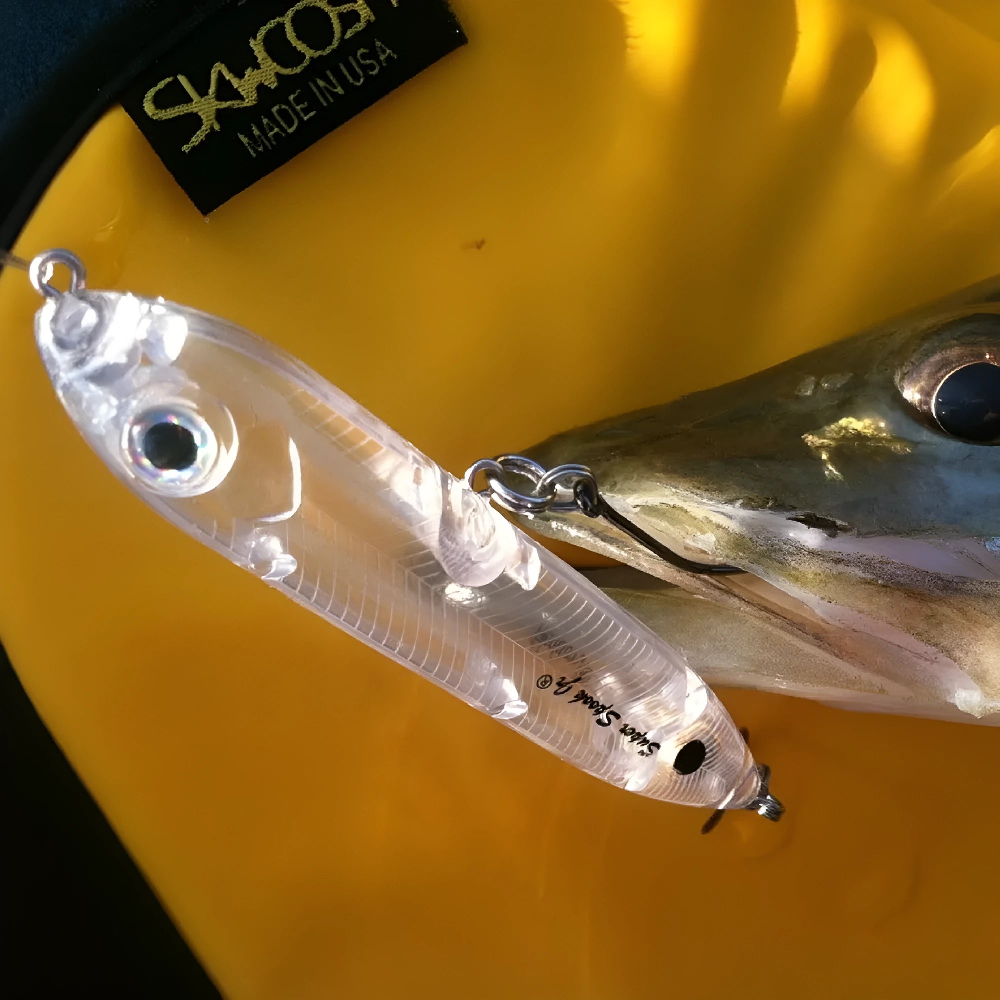 Transparent 9.5cm long ABS plastic blank fishing lure body with detailed shape and eye holes.