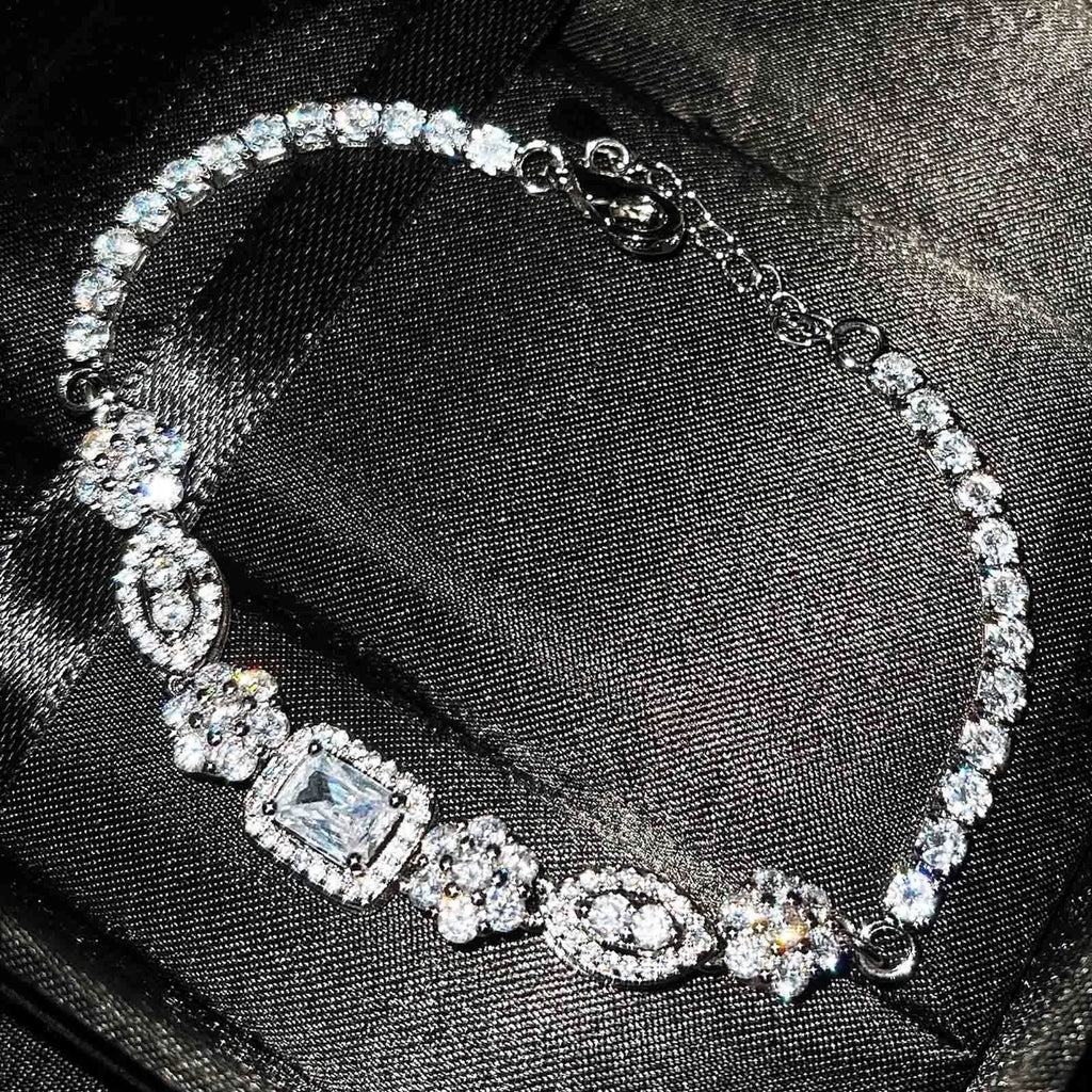 Women's geometric bracelet with zircon stones and silver plating in two size options