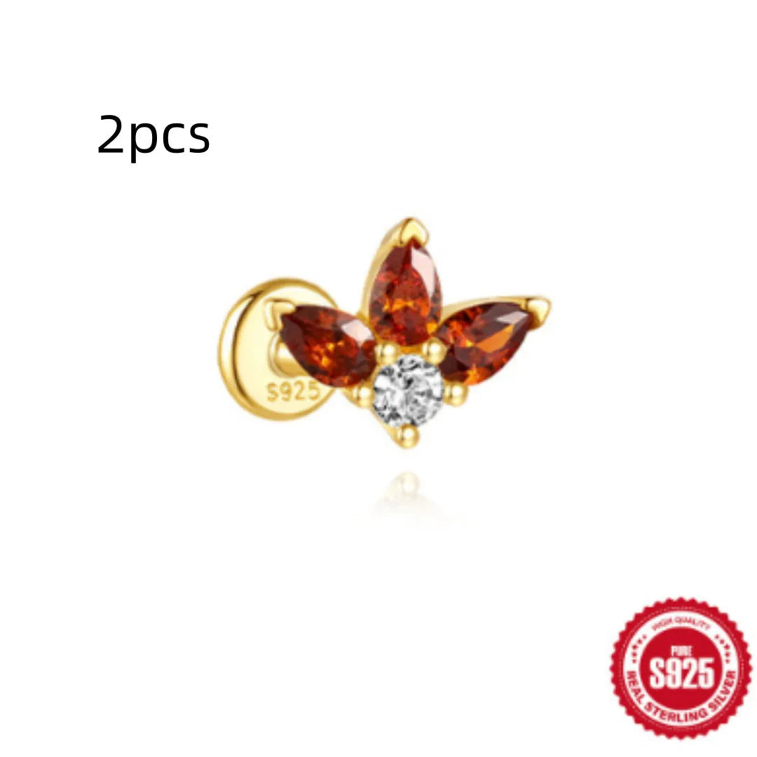S925 sterling silver water drop shaped earring with a flat spiral puncture pattern, in a gold tone finish.