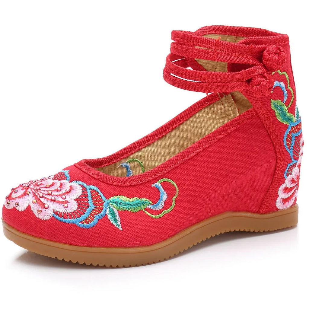 Women's canvas high heels with ethnic pattern, rhinestone detail, and double buckle in beige colour