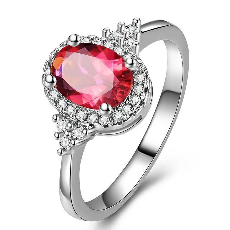 Adjustable open mouth copper ring with oval ruby stone in white gold colour