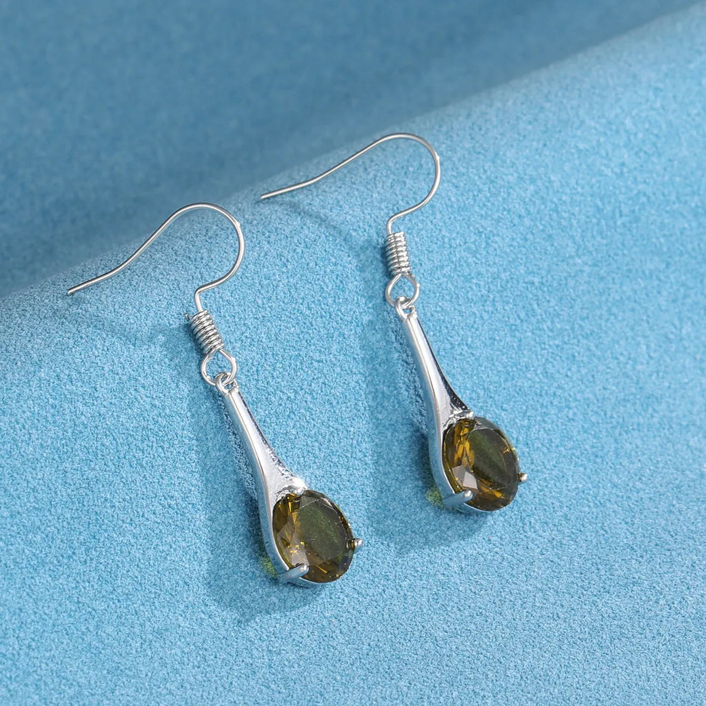 Olive green topaz earrings with water drop shape and retro style design