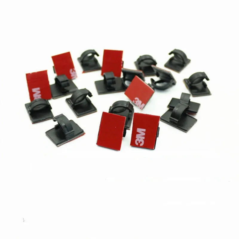 Self-adhesive plastic flat cable wiring buckle for car wire management in black.