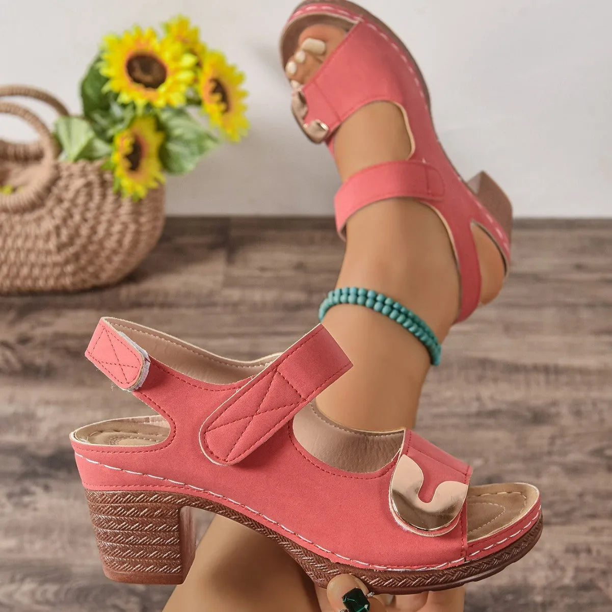 Women's light brown Velcro-strap Roman sandals with a round toe and rubber sole.
