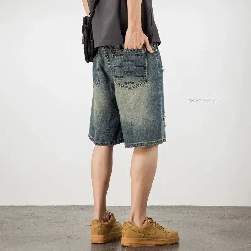Men's loose fit washed blue denim shorts with straight leg and micro elasticity