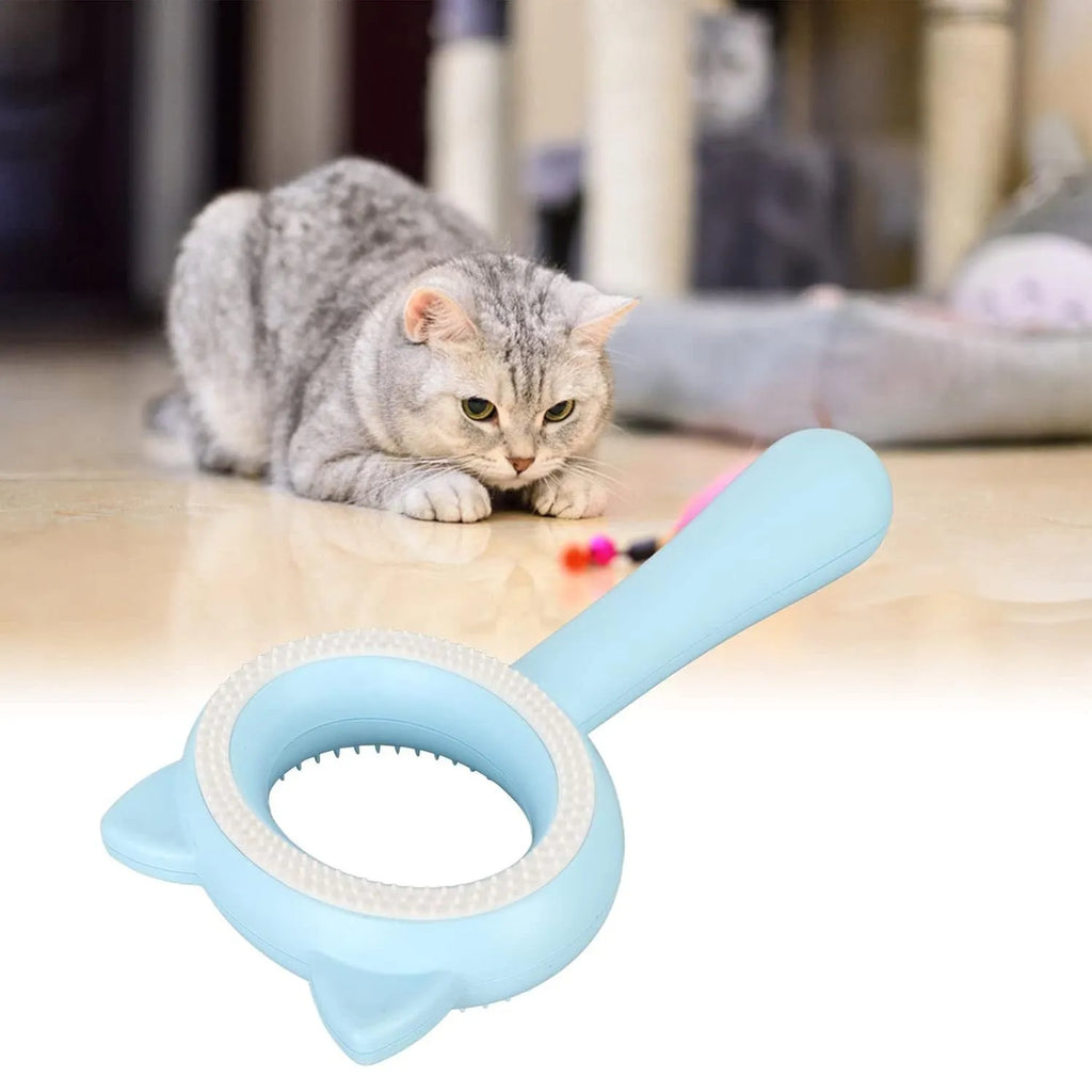 Blue and white double-sided pet grooming brush with ergonomic handle for cats and dogs.