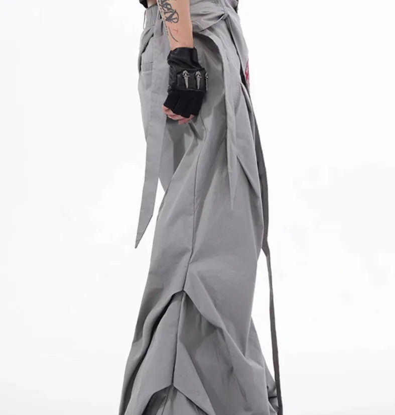 Boy modelling black wide-leg Korean-style summer pants on a casual backdrop.