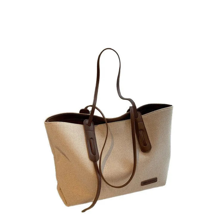 Shoulder bag in Oxford cloth with double straps, available in Black and Brown, size 46x32x27cm